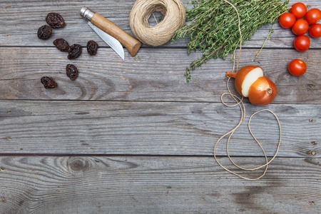 assorted ingredients on old wood background in daylightの写真素材