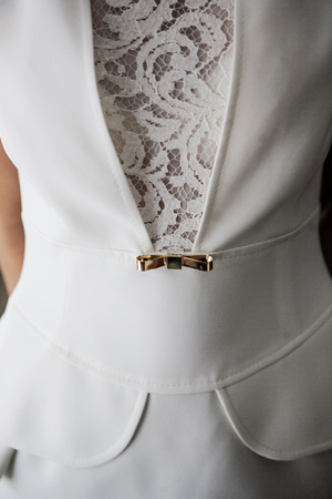 woman's white suit with lace texture close-upの写真素材