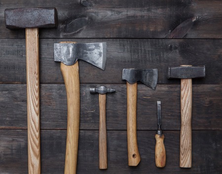 assorted tools for carpenter on wood backgroundの写真素材