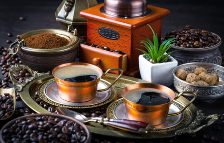 Black coffee in a cup on old backgroundの写真素材