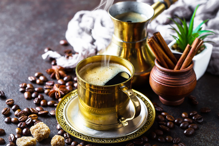 Coffee in a cup on old backgroundの写真素材