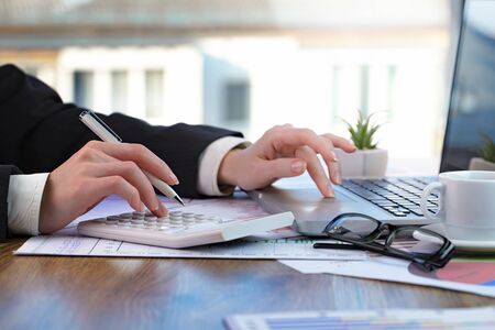 Female hands with items for businessの写真素材