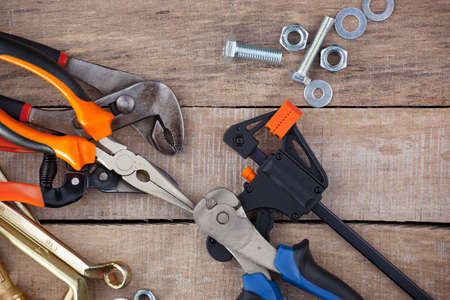 Different tools on the old background.
