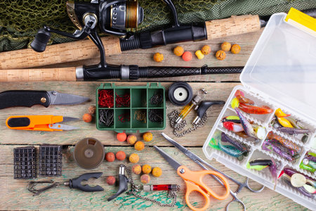 Spinning and fishing rods on an old background