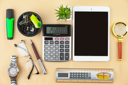 Flat lay composition with electronic devices and stationery on color backgroundの写真素材