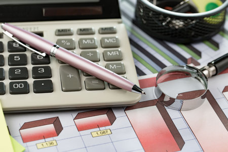 calculator and pen on the table with financial report. Accountingの写真素材