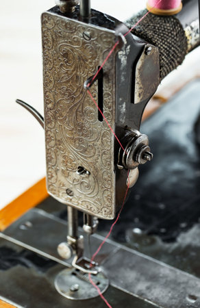 Close-up of a sewing machine. Sewing process. Selective focus.