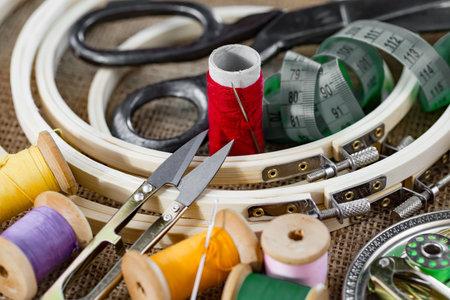 Sewing accessories for needlework. Threads, needles and measuring tape