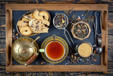 Tea hot drink on old wooden background. Top view. Flat layの写真素材