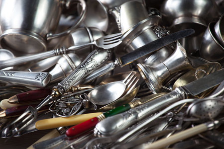 Old silverware and cutlery as a background, close upの写真素材