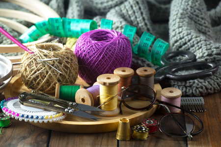 Sewing accessories on a wooden table. Accessories for sewing.の写真素材