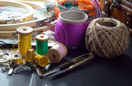 Spools of thread, scissors, buttons and other accessories for needleworkの写真素材