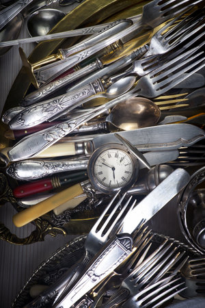 Vintage silverware and cutlery in a flea marketの写真素材