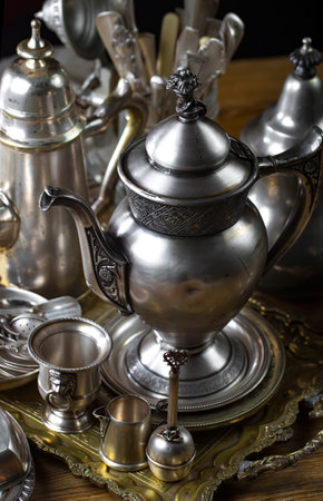 Vintage silver tea set on a wooden table. Selective focus.の写真素材