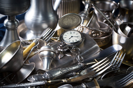 Vintage silverware and silverware in a flea market.の写真素材