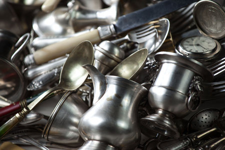 Vintage silverware in a flea market. Selective focus.の写真素材