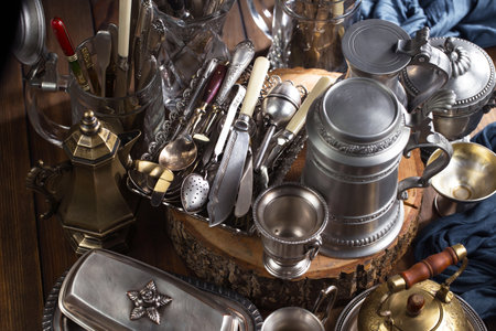 Vintage kitchen utensils on a wooden table. Vintage style.の写真素材