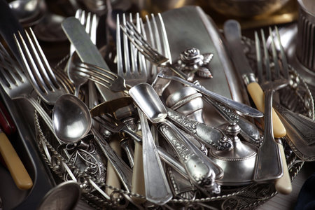 Vintage silverware and cutlery on the table. Selective focus.の写真素材