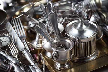 Vintage silverware and utensils in a flea marketの写真素材