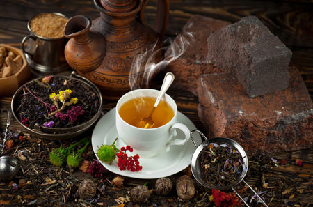 Tea hot drink on old background in composition on the theme of healthの写真素材