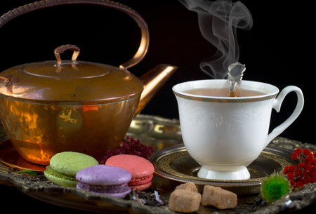 Tea and Macaroon on the table in oriental style.の写真素材
