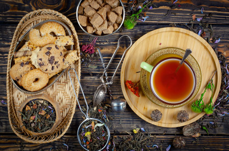 Cup of tea with cookies on a wooden background. Tea timeの写真素材