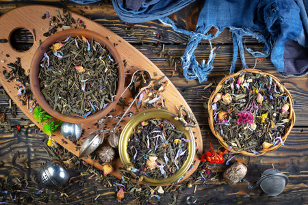 tea composition on a wooden background, top view, flat layの写真素材