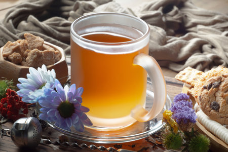 Cup of tea and cookies on a wooden table, still lifeの写真素材