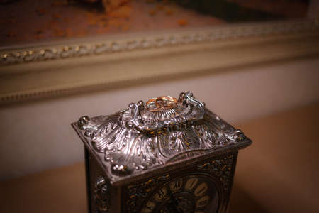 Engagement rings on an old jewelry boxの写真素材
