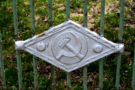 The Soviet symbol a sickle and a hammerの写真素材