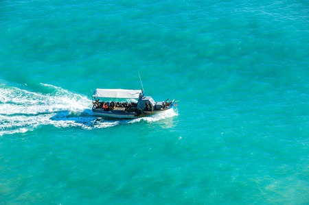 Fishing boat drifted in the sea. Turquoise seaの写真素材