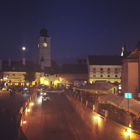 Clock tower in the full moon night.の素材