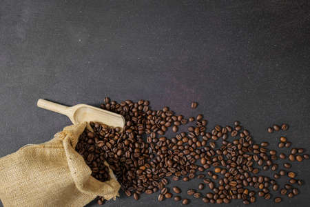 coffee beans on rustic slate background conzeptの写真素材
