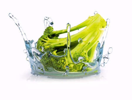 Broccoli in water splash isolated on white background.の写真素材