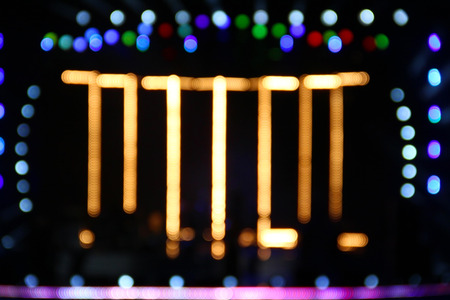 Blurred background with bokeh lights of concert stage