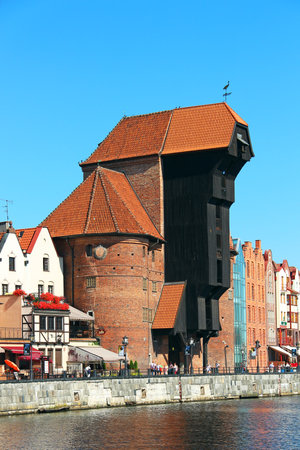 GDANSK, POLAND - JULY 27, 2012: Medieval port crane Zuraw on the bank of Motlawa river in downtown Gdanskのeditorial素材