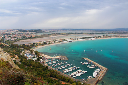 Aerial view of Poetto beach and Marina Piccola port, Cagliari, Sardinia, Italyの写真素材