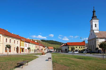 Central street of Spisske Podhradie town and Spis Castle (Spissky hrad) on the hill, Slovakiaの写真素材