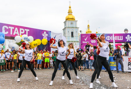 KYIV, UKRAINE - JUNE 3, 2018: Red Foxes cheerleaders team performs during the 26th Kyiv Chestnut Charity Run 2018のeditorial素材