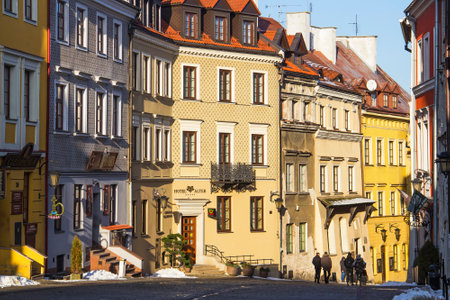LUBLIN, POLAND - JANUARY 18, 2018: Beautiful old buildings on Grodzka street in the old town of Lublin on sunny winter dayのeditorial素材