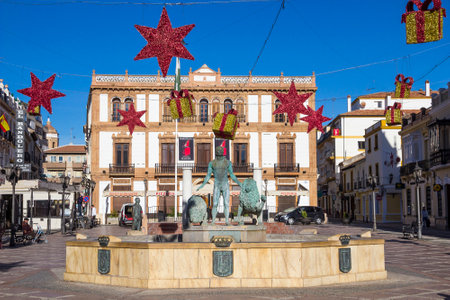 RONDA, SPAIN - DECEMBER 14, 2017: Sunny square (Plaza del Socorro) in the center of Ronda with holiday decoration for Christmasのeditorial素材