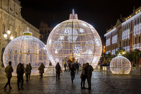 SEVILLE, SPAIN - DECEMBER 15, 2017: Illuminated holiday decorations on San Francisco square near city hall in the center of Sevilleのeditorial素材