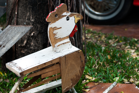 Old wooden rocking chair for childrenの写真素材