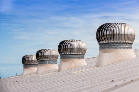 Roof Ventilators of a industrial factory in Samutsakorn Industrial Estate, Thailandの写真素材