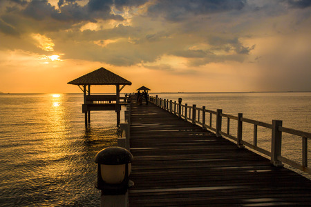 Landscape of Wooded bridge in the port between sunsets at Pattaya beach, Thailandの写真素材