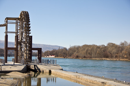 water wheel beside the river in winter season at China
