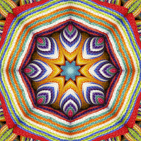 Abstract background colorful wallet pattern kaleidoscope sisal, mandala weave fractal, snow on center designの写真素材