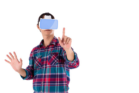 Young man wearing virtual reality headset, 3D technology entertainment and people concept on white background, isolated, include path and copy spaceの写真素材