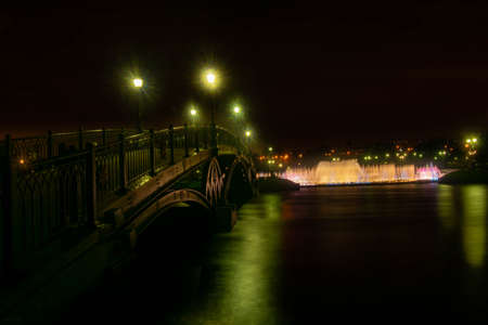 bridge over the night lakeの写真素材