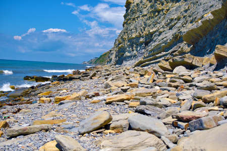 sea rocky coast on a sunny summer dayの写真素材